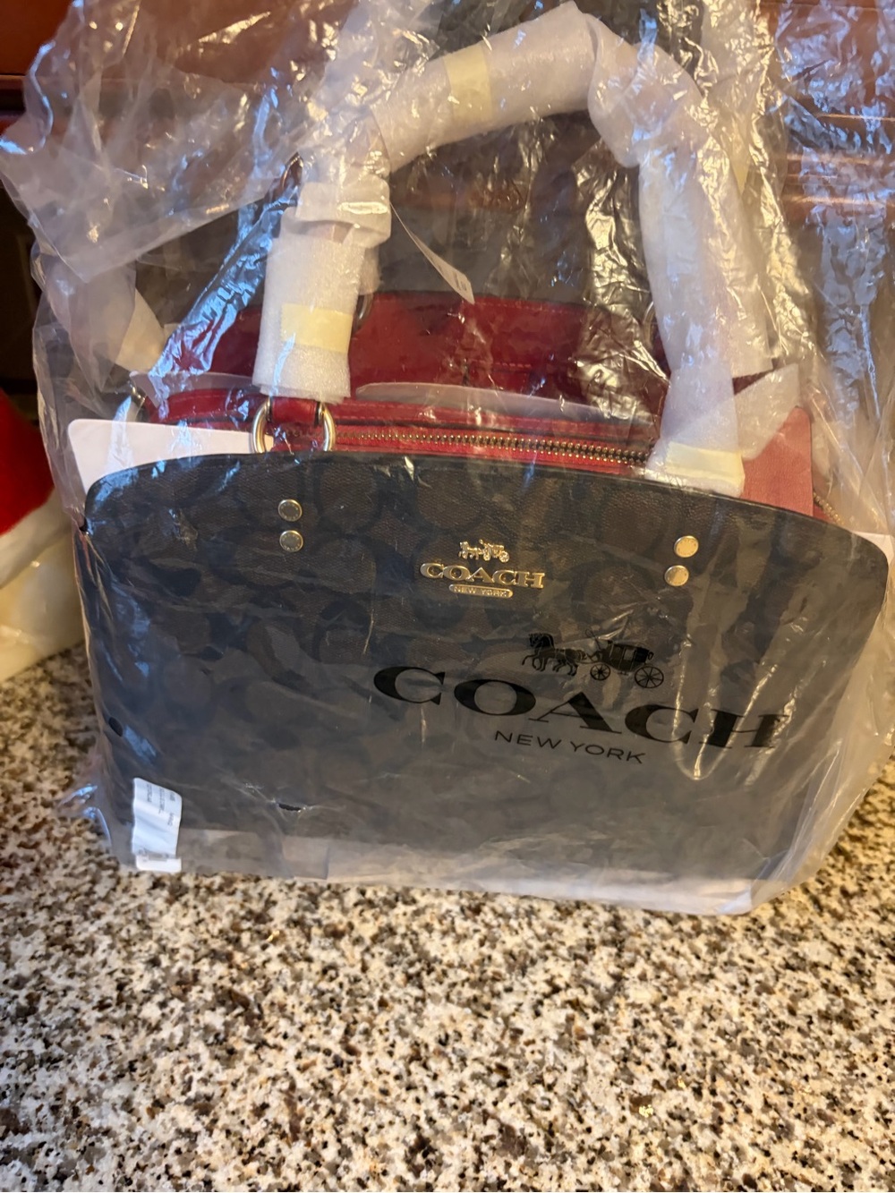 Coach Satchel in Brown with Red Interior Accents